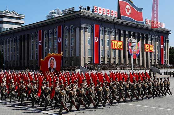 North Korea holds 70th anniversary parade, without ICBMs