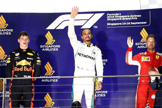 Hamilton wins Singapore Grand Prix to increase title lead