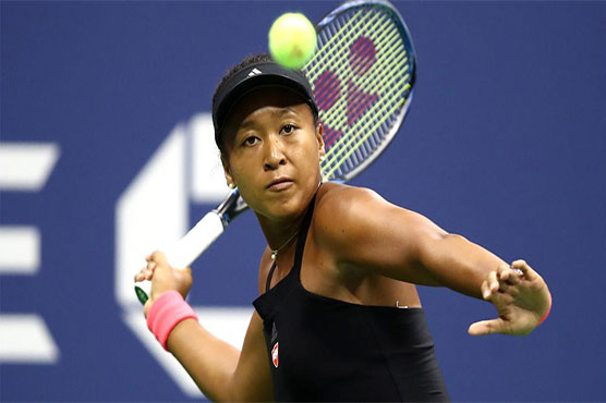 Japan's Naomi Osaka blazes into Tokyo quarters