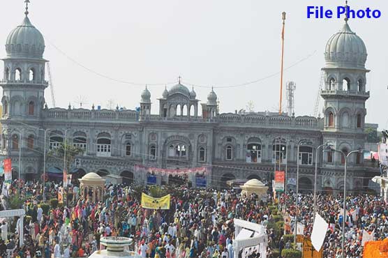 Sikh yatrees perform religious rituals at Gurudwara Janam Asthan