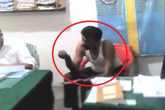 Cop suspended over not wearing shirt in police station