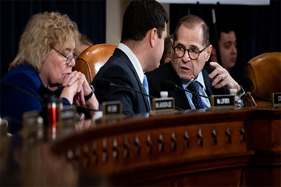 US lawmakers clash over impeachment charges against Trump