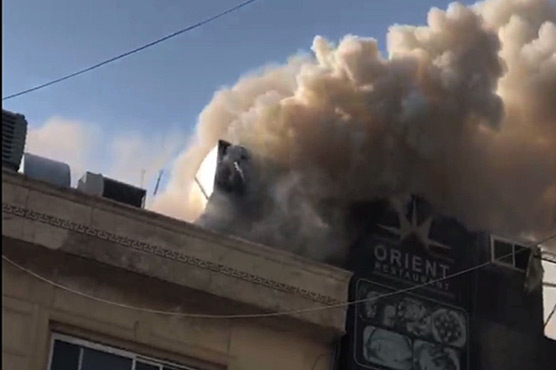 Firefighters extinguish fire at Sector F-10's restaurant in Islamabad