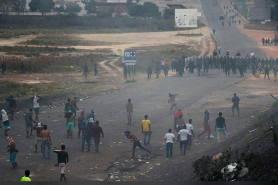 Maduro's troops block Venezuela aid convoy with tear gas, bullets