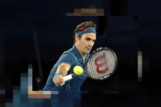 Federer serves up dominant first-round win against Istomin