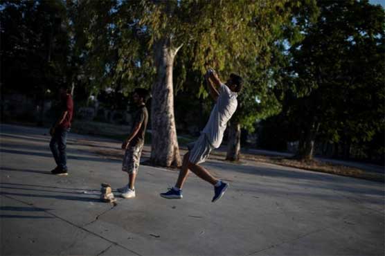 Pakistan's street cricketers bring game to life in Greece