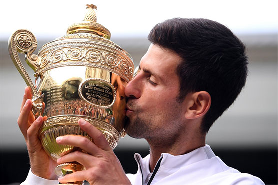 Djokovic saves match points to claim fifth Wimbledon title
