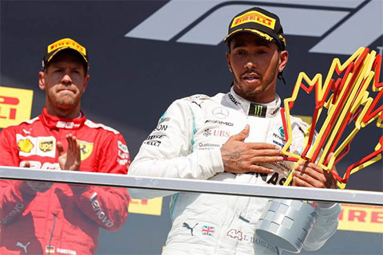 Hamilton takes controversial Canada win after Vettel penalised