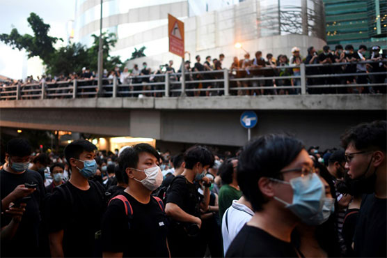 Thousands converge on Hong Kong police HQ in anti-govt demo