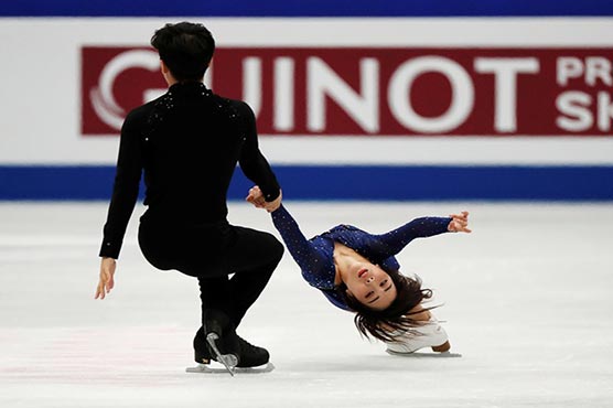Defending champion Chen takes strong lead in men's short programme