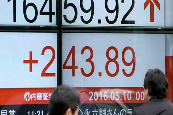 Tokyo stocks close higher with eyes on trade talks
