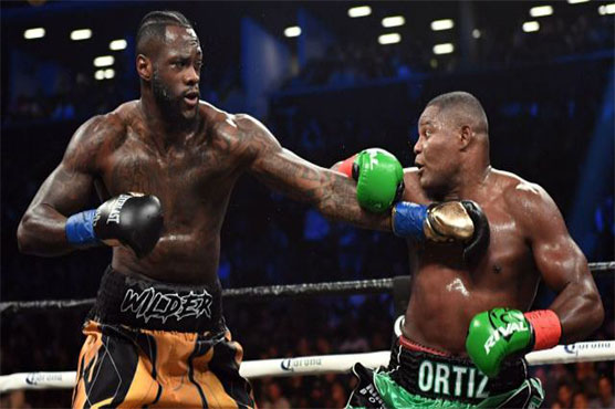 Wilder ready to risk all against 'King Kong' Ortiz