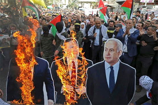 Thousands of Palestinians protest US move on Israeli settlements