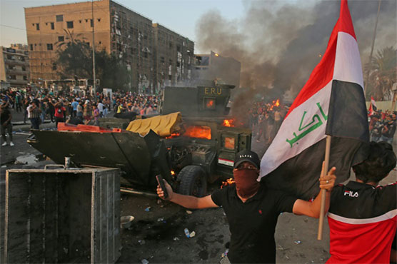 Thousands in bloody protests across Iraq, 30 dead