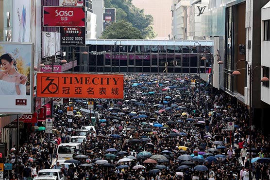 Thousands stage illegal Hong Kong march; shops, metro stations trashed ...