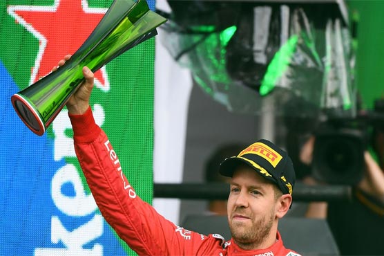 Vettel takes issue with 'selfie guy' and sponsored trophy