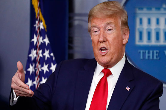 Trump announces gradual US reopening against dire economic backdrop