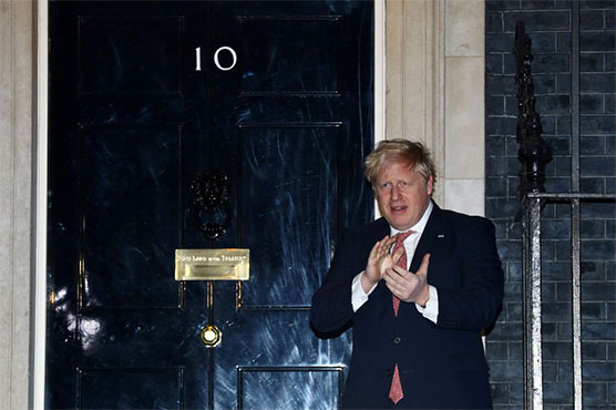 UK reports lowest virus toll in weeks as Johnson returns