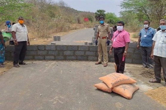 Indian state puts up walls on roads to stop spread of coronavirus