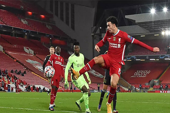 Youngsters see depleted Liverpool into last 16