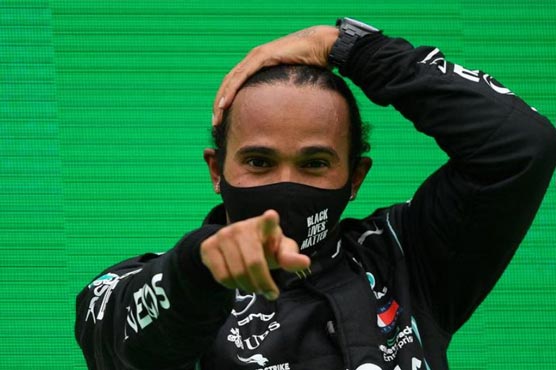 Hamilton to race in Abu Dhabi after negative COVID-19 test