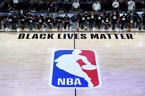 Players kneel as NBA restarts in Florida 'bubble'
