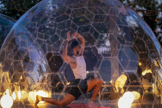 Yoga enthusiasts bend the rules as hot yoga domes pop-up in Toronto -  WeirdNews - Dunya News