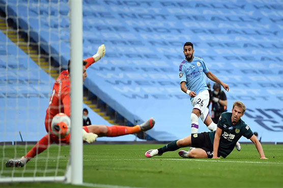 Man City crush depleted Burnley to keep Liverpool waiting