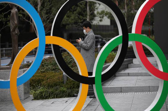 Japan committed to hosting Olympics on schedule even as virus spreads