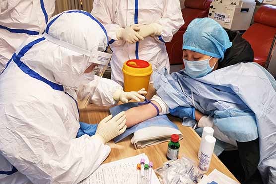 Chinese doctors reveal 14pc of 'recovered' patients test positive again