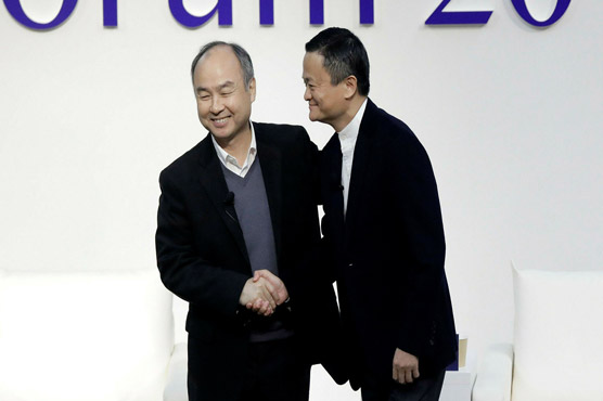 SoftBank Group reports record losses as Ma quits board