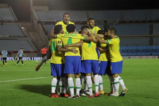 Brazil beat Uruguay 2-0 to stay top of qualifying group