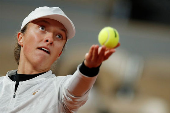 Polish teenager Swiatek powers into French Open semis