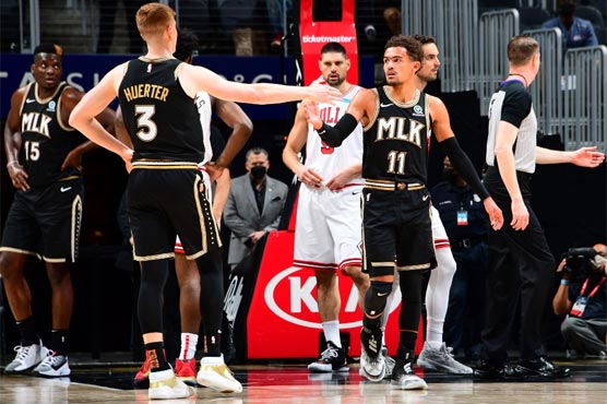 Young carries Hawks past Bulls, Zion Williamson flies high