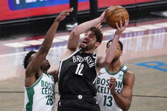 Nets hold on to edge Celtics and regain first place in East