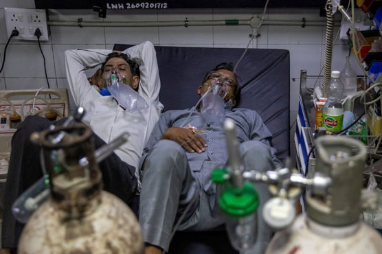 India's daily Covid death toll hits new record as shortages bite