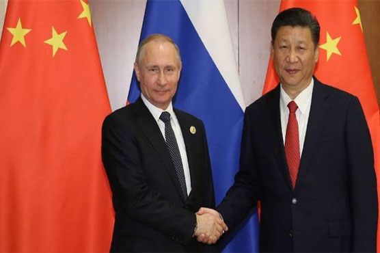 Putin, Xi agree to jointly combat Afghanistan 'threats'