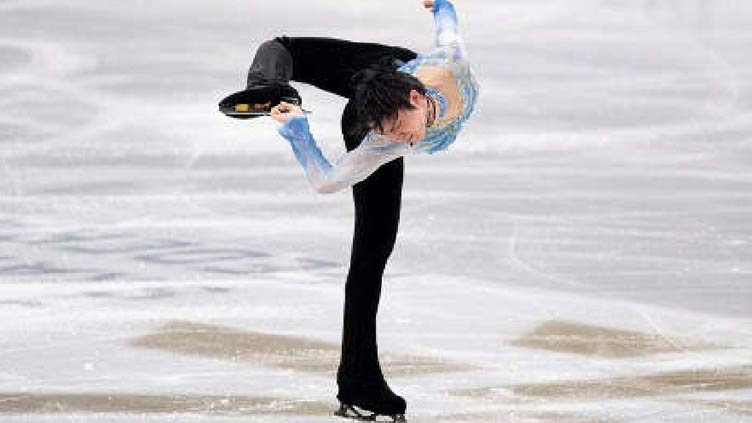 Hanyu leads Japan nationals on injury comeback