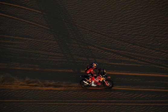 Former Dakar bike champion Price crashes out, Peterhansel wins elusive stage