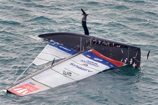 'Knives out' to save crew after spectacular America's Cup capsize