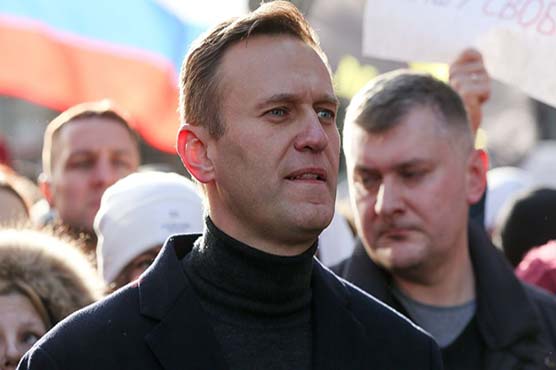 Kremlin dismisses calls to free Navalny, warns against protests