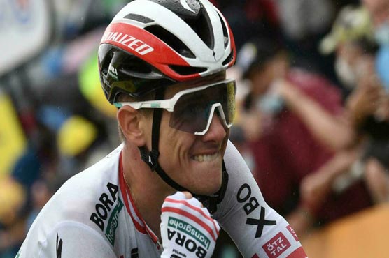 Konrad wins hilly Tour stage as elite clique finish together