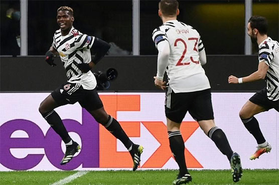 Pogba downs Milan to send Man United into Europa League last eight