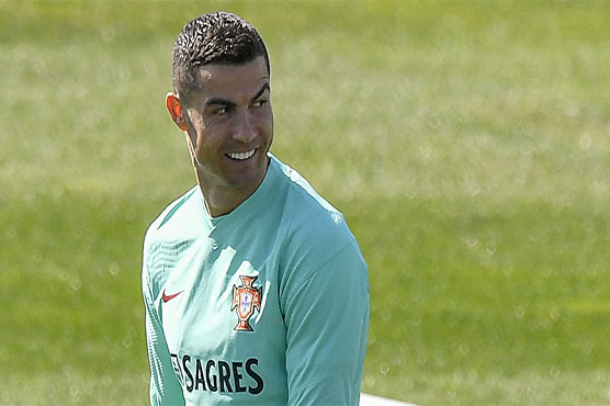 Ronaldo's spirits high despite Juve setbacks, says Portugal's Santos
