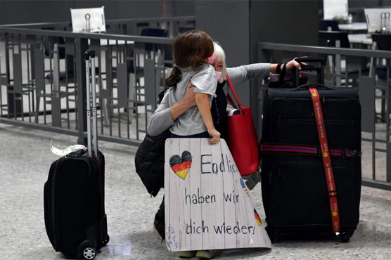 Tears, relief, long lines as US reopens borders after 20 months