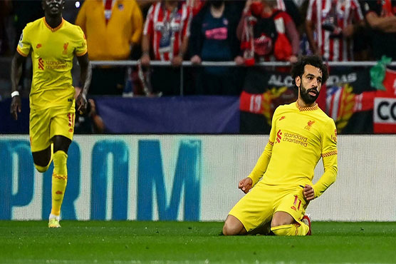Liverpool defeat 10-man Atletico in five-goal thriller as Salah delivers again