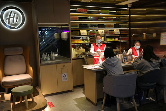 Chinese hot pot chain Haidilao slows growth as COVID-19 curbs consumer appetite