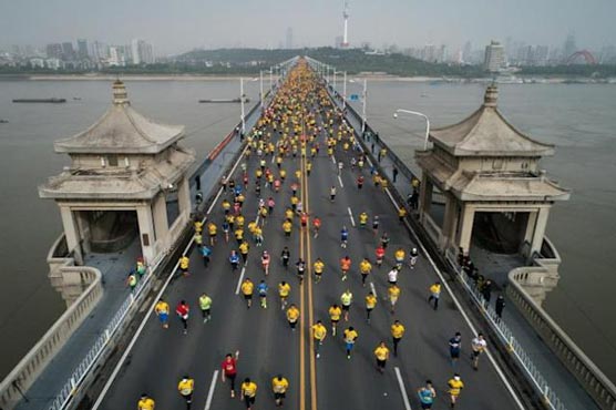 Wuhan Marathon postponed as China battles Covid-19 spike