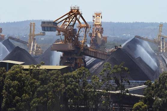 Australia vows to keep mining coal despite climate warning