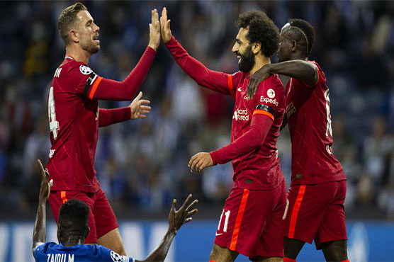 Salah, Firmino shine as Liverpool honour Hunt with Porto rout